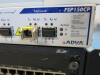 7 x Items of IT to Include: Lenovo Think Centre, Cisco Catalyst 2960, Cisco 2800, Cisco 800, Super Stack 3Com, ADVA FSP150CP & Panasonic KX-NCP500 (As Viewed). - 5