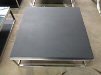 Coffee Table on Chrome Frame with Black Faux Leather Top. Size H34cm x W100cm x D100cm.