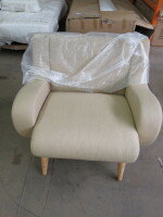 Low Back Armchair on Wooden Feet Upholstered in Off White Fabric.