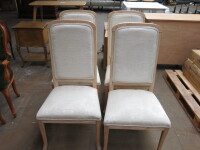 4 x Wooden Dining Chairs Upholstered in White Fabric.