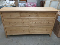 Willis & Gambier 7 Drawer Wooden Chest of Drawers. Size H89cm x W150cm x D48cm. NOTE: missing 1 drawer knob.