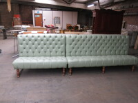 2 Piece Banquet Seating, Upholstered in Light Green Faux Leather with Button Back & Wooden Feet. Size H106cm x W210 & 140cm x D70cm. Overall Length 350cm.