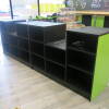 2 Till Counter System Shop Check Out with Confectionary Shelving to Front & Open Storage & Shelving to Rear in Matt Black with Lime Green. Size 300cm (L) x 100cm (H) x 60cm (D). - 2