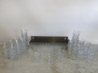 Quantity of Glassware to Include: 36 x Shot Glasses & 50 x Juice Glasses & 1 x Metal Bar Bottle Holder.