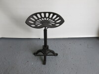 Cast Metal Stool in Brown with Tractor Style Seat with Adjustable Height & Foot Rest.