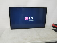 LG 49" Ultra HD TV, Model 49UH610V. Comes with Wall Bracket & Remote.