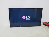 LG 49" Ultra HD TV, Model 49LH590V. Comes with Wall Bracket & Remote.