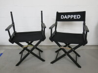 2 x Wooden Fold Out Directors Chairs in Black (1 x Missing Back).