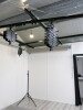 Quantity of Assorted Photographic Equipment to Include: 4 x Scissor Light Lifts with Rig, Manfrotto 098B Wall Boom, Tripod in Box, 3 x Rollers with Chain & Brackets and Approx 15 x Assorted Paper Backdrops. - 2