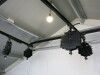 Quantity of Assorted Photographic Equipment to Include: 4 x Scissor Light Lifts with Rig, Manfrotto 098B Wall Boom, Tripod in Box, 3 x Rollers with Chain & Brackets and Approx 15 x Assorted Paper Backdrops. - 10