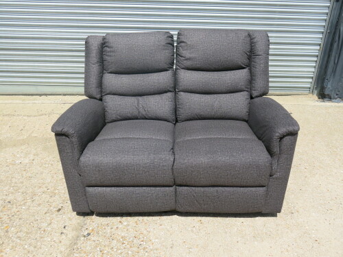 Parma Loveseat Grey Fabric 2 Seater Recliner Sofa. Size H96 x W135 x D80cm. Ex Display. Note: small tear to fabric on cushion back.