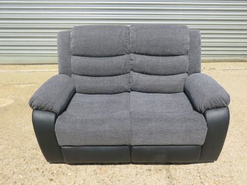 Chicago Grey Fabric & Black Premium Aire Leather 2 Seater Recliner Sofa. Size H96 x W145 x D84cm. New/Ex Display. RRP &pound;699.00. NOTE: scuff to corner.