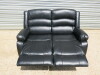 Black Premium Aire Leather 2 Seater Recliner Sofa. Size H100 x W145 x D94cm. Ex Display. - 4