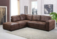 Toronto Large Tan Bonded Leather Left Hand Corner Sofa with Footstall. Size H84 x L265 x W230 x D82cm. Boxed/New, RRP £1420.00. NOTE: slight damage to footstall.