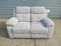 2 x Caro 'Dakota' Light Grey Fabric Reclining 2 Seater Sofas, Size H96 x W205 x D85cm. Boxed/New, RRP &pound;1498.00