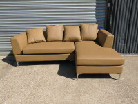 Abreo L Shape Sofa Set in Camel Leatherette on Chrome Legs and Comes with 4 Cushions. Size H70 x L230 x W160 x D82cm. New/Ex Display.