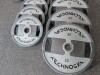 Set of 24 Technogym Urethane Disc Weights in Grey & Black to Include: 6 x 20kg, 7 x 10kg, 4 x 5kg, 3 x 2.5kg & 4 x 1.25kg. - 3