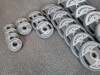 Set of 24 Technogym Urethane Disc Weights in Grey & Black to Include: 6 x 20kg, 7 x 10kg, 4 x 5kg, 3 x 2.5kg & 4 x 1.25kg. - 4