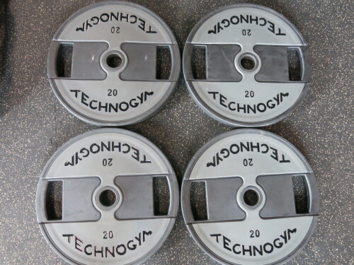 Set of 4 x 20kg Technogym Urethane Disc Weights.