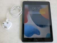 Apple iPad 6th Gen, Model MR7F2B/A, 32GB in Silver with Charger & Spigen Hard Black Case.