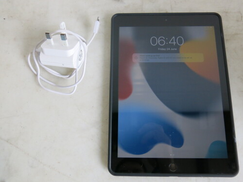 Apple iPad 6th Gen, Model MR7F2B/A, 32GB in Silver with Charger & Spigen Hard Black Case.