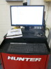 Hunter Hawk Eye Elite, RSMT-CKD, S/N BCC1418 Wheel Alignment System with 4 Post Lift Lign 5000kg Lift, Laser Alignment Arm with Read Out Display & Wheel Attachments. Comes with Diagnostics Comms Cabinet to Include RIP PC HW2 Series, Running Windows 10 Ent - 15