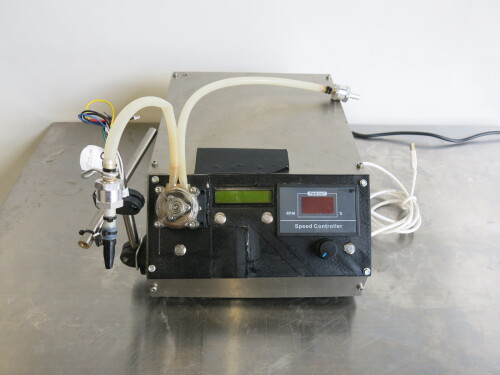 Precise Liquid Filling Machine. Dispensing Quantities 10ml-50ml.