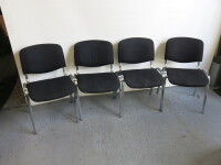 4 x Black Fabric Stackable Chairs on Chrome Frame. Note: condition (As Viewed/Pictured).