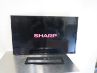 Sharp Aquos 40" LCD Color TV, Model LC-40FG5151KF. Comes with Wall Bracket. NOTE: missing remote control.