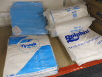 Large Quantity of Assorted PPE & Covid Tests to Include: 15 x Assorted Packs of Disposable Aprons/Coveralls to Include: 4 x Tyvek Classic Coveralls, 2 x Packs of 20 Blue Aprons, 5 x Rolls of 200 White Aprons & 4 x Packs of 100 Dolphin Disposable White Apr