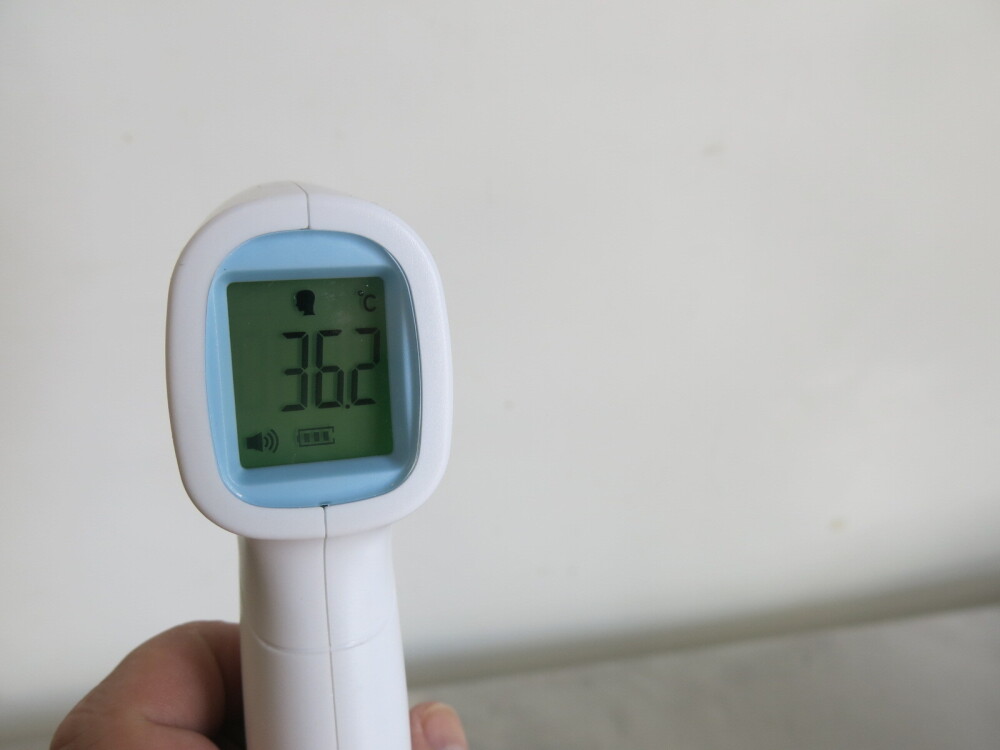 Infrared Thermometer, Model TKE302. Comes in Original Box with