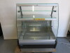 Mafriol Safira Curved Glass Illuminated Serve Over Counter, Model Vitrina Safira 900 FE-VCR, S/N 21004429, DOM 2021. Financed New 09/21 �2723.00. Size H129 x W97 x D90cm. 
NOTE: Balance of 2 Year parts & Labour warranty.