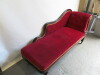 Chaise Lounge with Wooden Scroll Top Frame. Upholstered in Red Velour with Gold Braiding Detail on Metal Castors. Size H80 x W180 x D65cm. NOTE: missing 1 Castor. - 2