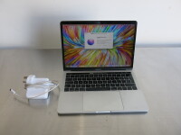 Apple 13" MacBook Pro, Year 2019, Model A2159. Running MacOS Monterey, 1.4 Ghz Quad Core Intel Core i5, Intel Iris Plus Graphics, 8GB RAM, 121GB Flash Storage. Comes with Power Supply.