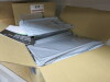 Large Quantity of Assorted PPE & Covid Tests to Include: 15 x Assorted Packs of Disposable Aprons/Coveralls to Include: 4 x Tyvek Classic Coveralls, 2 x Packs of 20 Blue Aprons, 5 x Rolls of 200 White Aprons & 4 x Packs of 100 Dolphin Disposable White Apr - 3