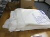 Large Quantity of Assorted PPE & Covid Tests to Include: 15 x Assorted Packs of Disposable Aprons/Coveralls to Include: 4 x Tyvek Classic Coveralls, 2 x Packs of 20 Blue Aprons, 5 x Rolls of 200 White Aprons & 4 x Packs of 100 Dolphin Disposable White Apr - 5