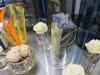 Quantity of Tableware to Include: 9 x Vases, 2 x Lanterns, 5 x Flower Holders, 2 x Candle Holders & 5 x Boxes of Assorted Napkins. - 6