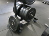 Set of 70 x BLK BOX Plate Weights to Include: 2 x 25kg, 10 x 20kg, 14 x 10kg, 24 x 15kg, 10 x 2.5kg, 10 x 1.25kg on 2 x Mobile Racks. - 6