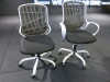 2 x Black & White Plastic Swivel Chairs.