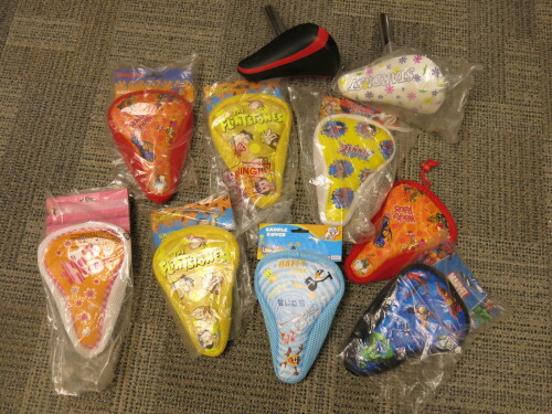 8 x Children's Bike Seat Covers & 2 x Seats.