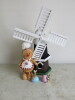 4 x Decorative Items to Include: 1 x Wooden Windmill (Size H56cm), 1 x Gingerbread Man & 2 x Ceramic Rabbits with Eggs.