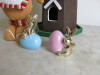 4 x Decorative Items to Include: 1 x Wooden Windmill (Size H56cm), 1 x Gingerbread Man & 2 x Ceramic Rabbits with Eggs. - 2