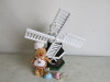 4 x Decorative Items to Include: 1 x Wooden Windmill (Size H56cm), 1 x Gingerbread Man & 2 x Ceramic Rabbits with Eggs. - 3