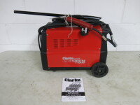 New Clarke Mig Welder, Model 130EN Turbo, S/N H-10500411. Comes with Instruction Manual.