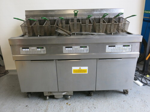 Frymaster 3 Lane Gas Floor Fryer System with Digital Controls & Filtration System, Model 31814 NFSE, S/N 1701PS0032, Size H120 x W153 x D85cm. Comes with 9 Baskets & 2 Mesh Skimmers.