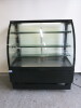 Sterling Pro Curved Glass Illuminated Cake Display Fridge, Model EVO120CV, S/N 201943757G, DOM 07/2019, with 3 Glass Shelves & 2 Sliding Doors. Size H135 x W120 x D75cm. - 2