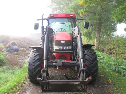 CN07 FJE: McCormick Agricultural Tractor Model MC115,