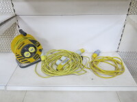 3 x Assorted 110v Extension Leads to Include: 1 x 25m Reel, 1 x 14m Lead & 1 Other (As Viewed/Pictured).