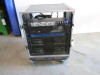 Flight Case Containing Sound System Including: 2 x QSC Powerlight 4, 2 Channel 4000w Professional Amplifiers, Nexo PS15 & Citronic Z44R Zone Mixer.