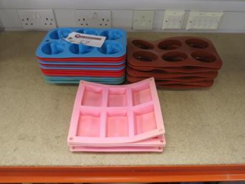 Quantity of Assorted Style of Silicon Donut Moulds.